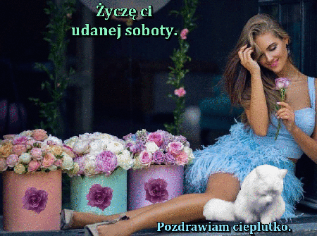 Kobieta z białym kotkiem w sobotę